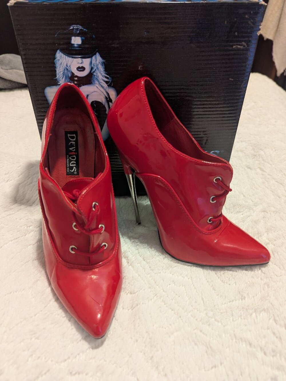 Devious red patent ankle boots